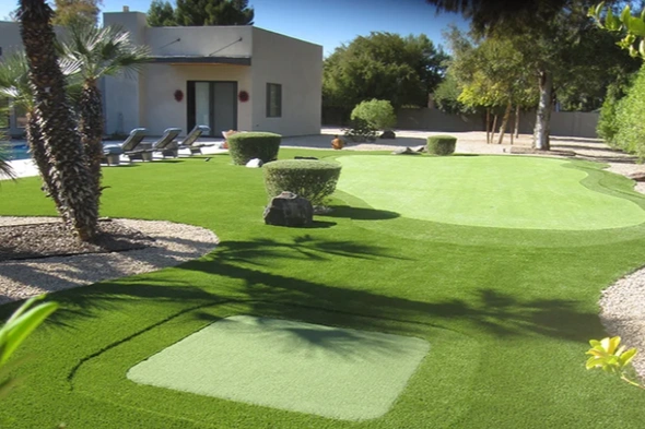 Phoenix backyard putting green with flags and trees